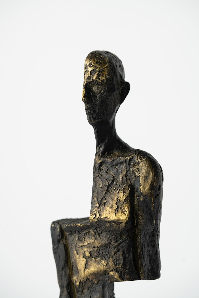 HALF-FACED SCULPTURE