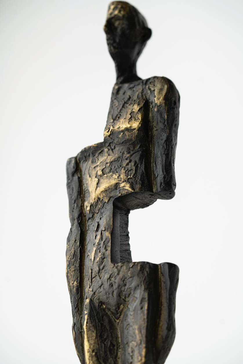 HALF-FACED SCULPTURE