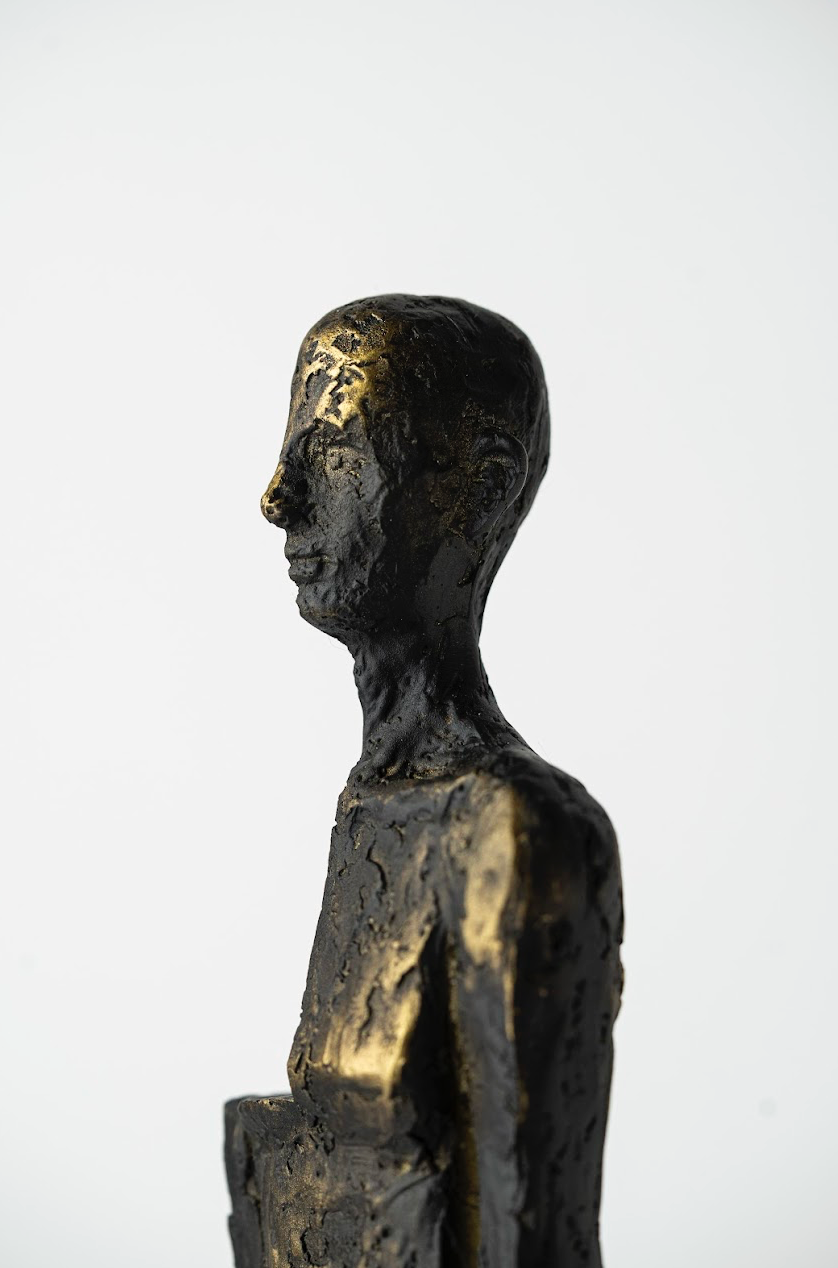 HALF-FACED SCULPTURE